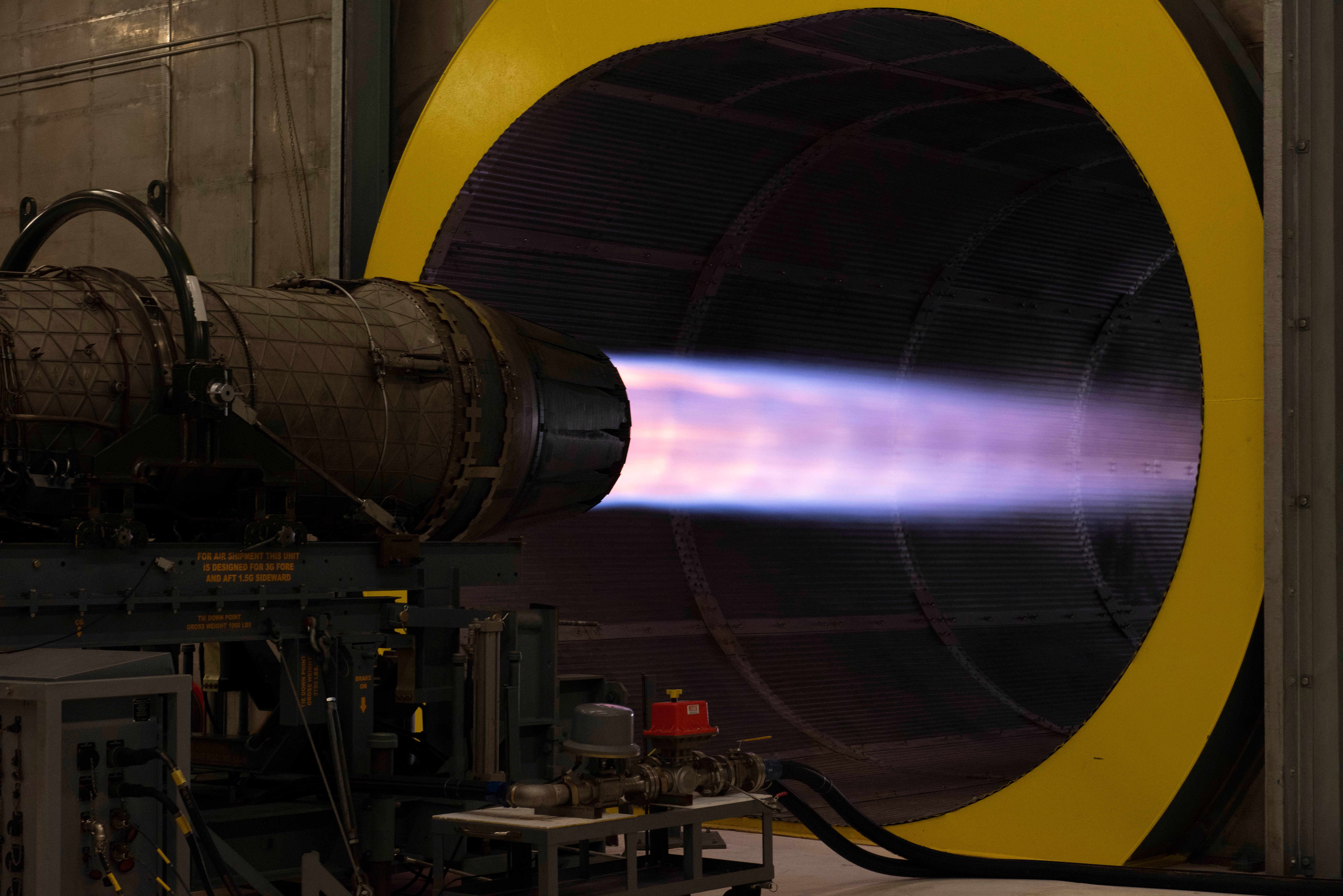 Airmen from the 49th Component Maintenance Squadron conduct a test run on a Pratt & Whitney F100 turbofan engine in the hush house at Holloman Air Force Base, New Mexico, Sept. 6, 2022. The hush house is a safe, enclosed environment designed to facilitate aircraft engine testing. (U.S. Air photo by Airman 1st Class Isaiah Pedrazzini)