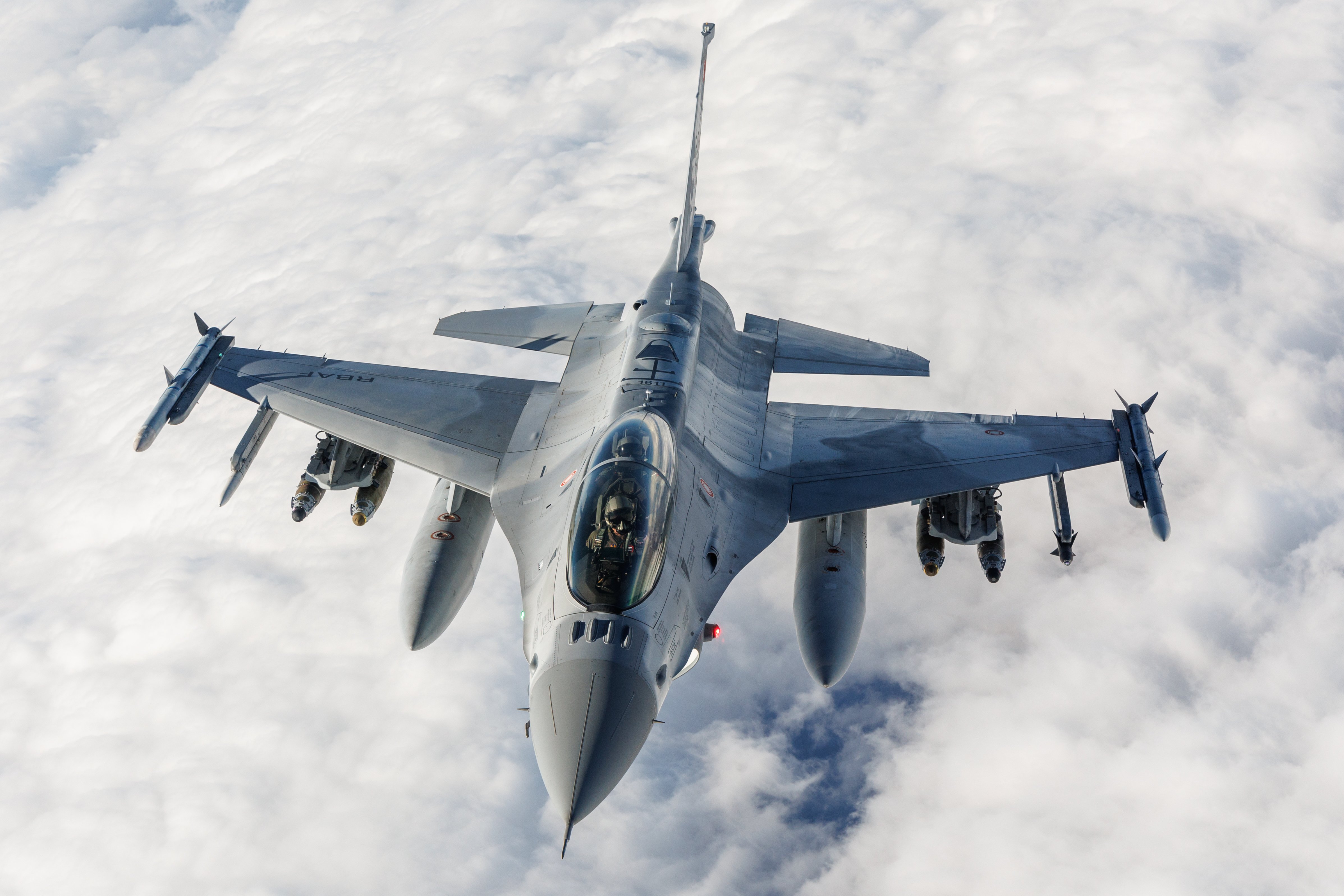 Air Force Reserve Crews over Southern California with the 370th FLTS from Edwards Air Force Base provide aerial refueling from a KC-135 to a Lockheed Martin F-16 Block 70 aircraft for the Royal Bahraini Air Force. The F-16 Block 70 is currently in developmental test with the 416th FLTS, Airpower Foundations Combined Test Force at Edwards. A sub-mission of the 416th FLTS is to provide flight test services for Foreign Military Sales customers of the F-16.