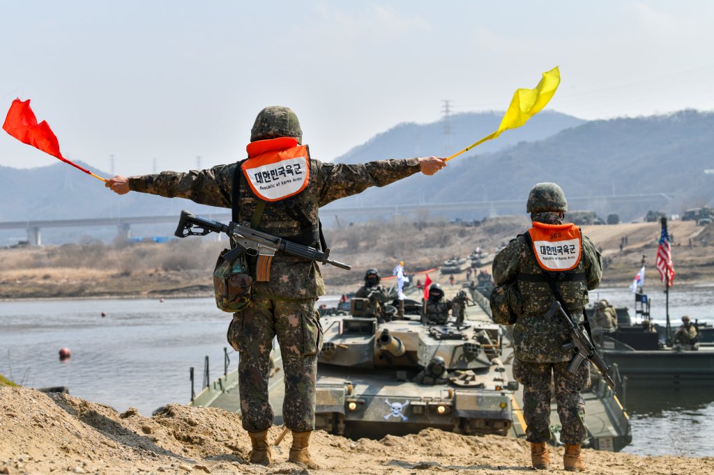 Republic of Korea Army 5th Engineer Brigade, K1A2 tank crosses a U.S. Army Improved Ribbon Bridge (IRB) during joint wet gap training as part of Freedom Shield 25 at Yeoncheon-gun, Republic of Korea, Mar. 20, 2025. Freedom Shield 25 is an annual combined military training exercise integrating ground, air, naval, space, and cyberspace elements to showcase capability, lethality, and enhance readiness through realistic combat scenarios. (U.S. Army photo by Sgt. Daniela Lechuga Liggio)