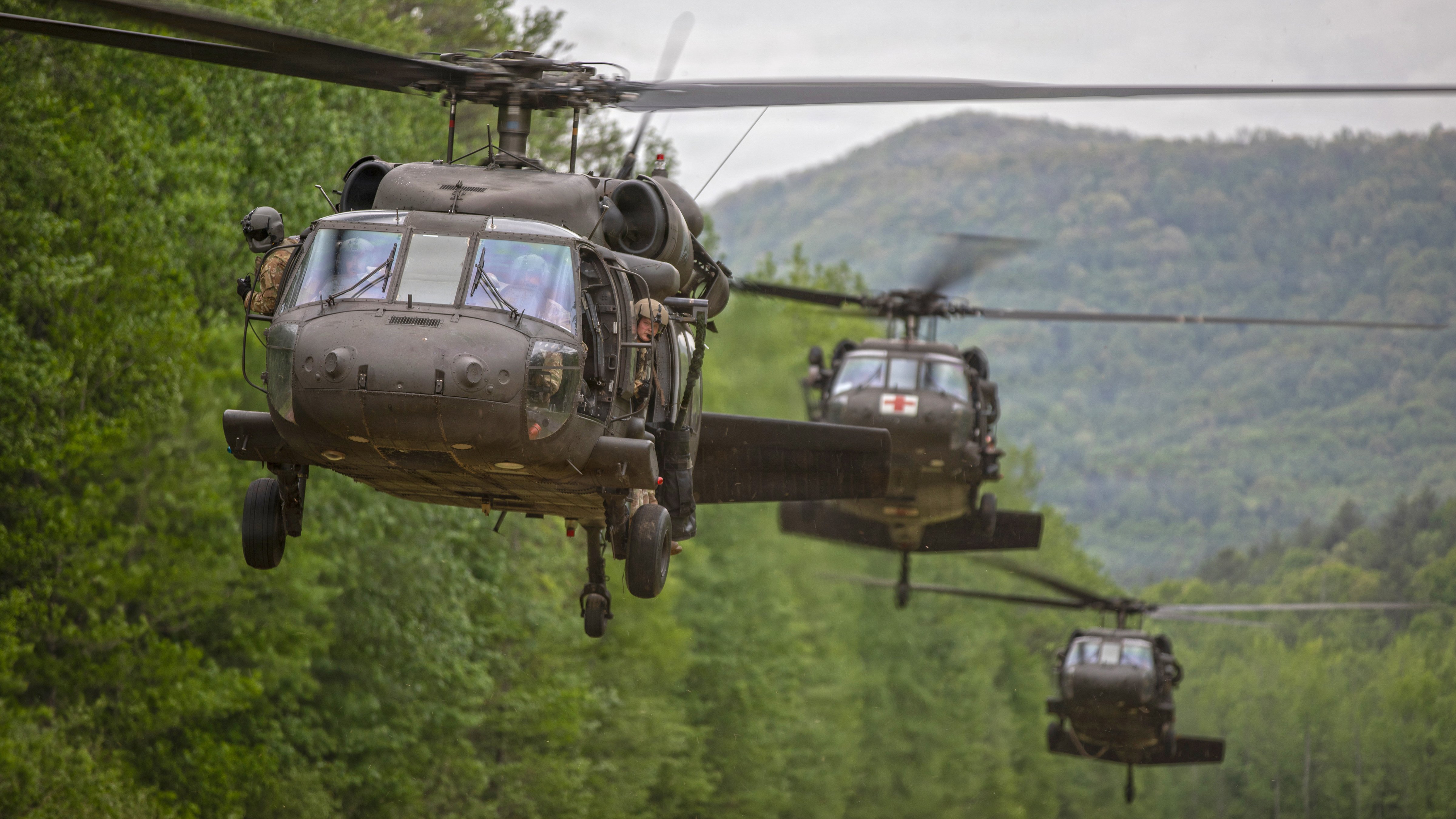Three U.S. Army UH-60 Black Hawk Helicopter, assigned to 4th Ranger Training Battalion (Ravens), takes off from Landing Zone 7A7 during the 5th RTB Open House at Camp Frank D. Merrill, Dahlonega, GA., April 25, 2026. The Ranger Open House is open to the public to show case Ranger School and the training Rangers endure to earn the Ranger Tab. (U.S. Army Reserve photo by 1st Sgt. Austin Berner)