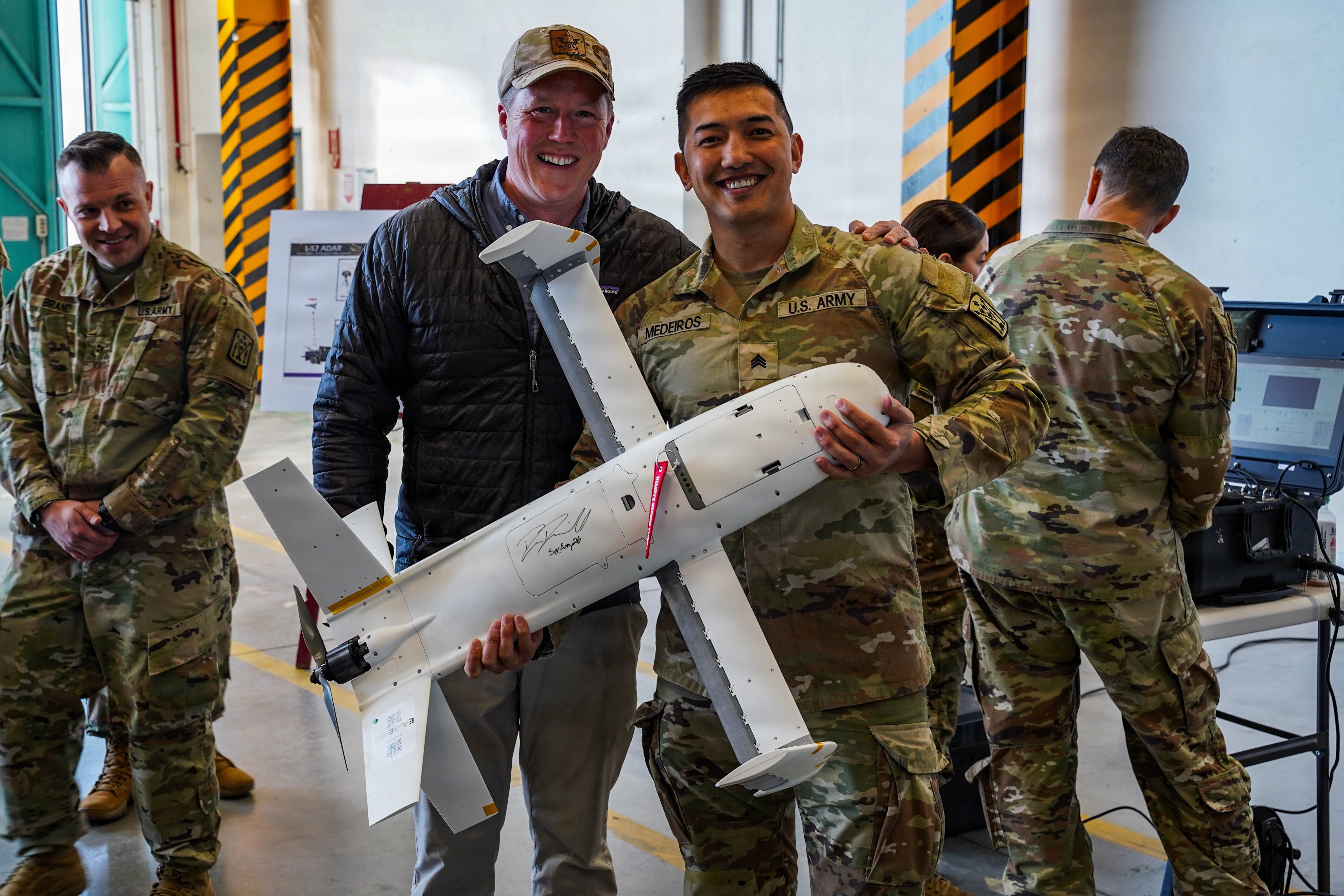 U.S. Secretary of the Army Daniel Driscoll, poses for a photo after signing a counter-unmanned aerial system April 30 in Ansbach, Germany. U.S. Army Brig. Gen. Curtis King, commanding general of 10th Army Air and Missile Defense Command, Brig. Gen. John Mountford, deputy commanding general of V Corps, Brig. Gen. Terry Tillis, commanding general of 7th Army Training Command, and their soldiers spoke on C-UAS that have been tested and implemented in the past year by 52d Air Defense Brigade and 12th Combat Aviation Brigade (U.S. Army photo by Sgt. 1st Class Jacob Kohrs).
