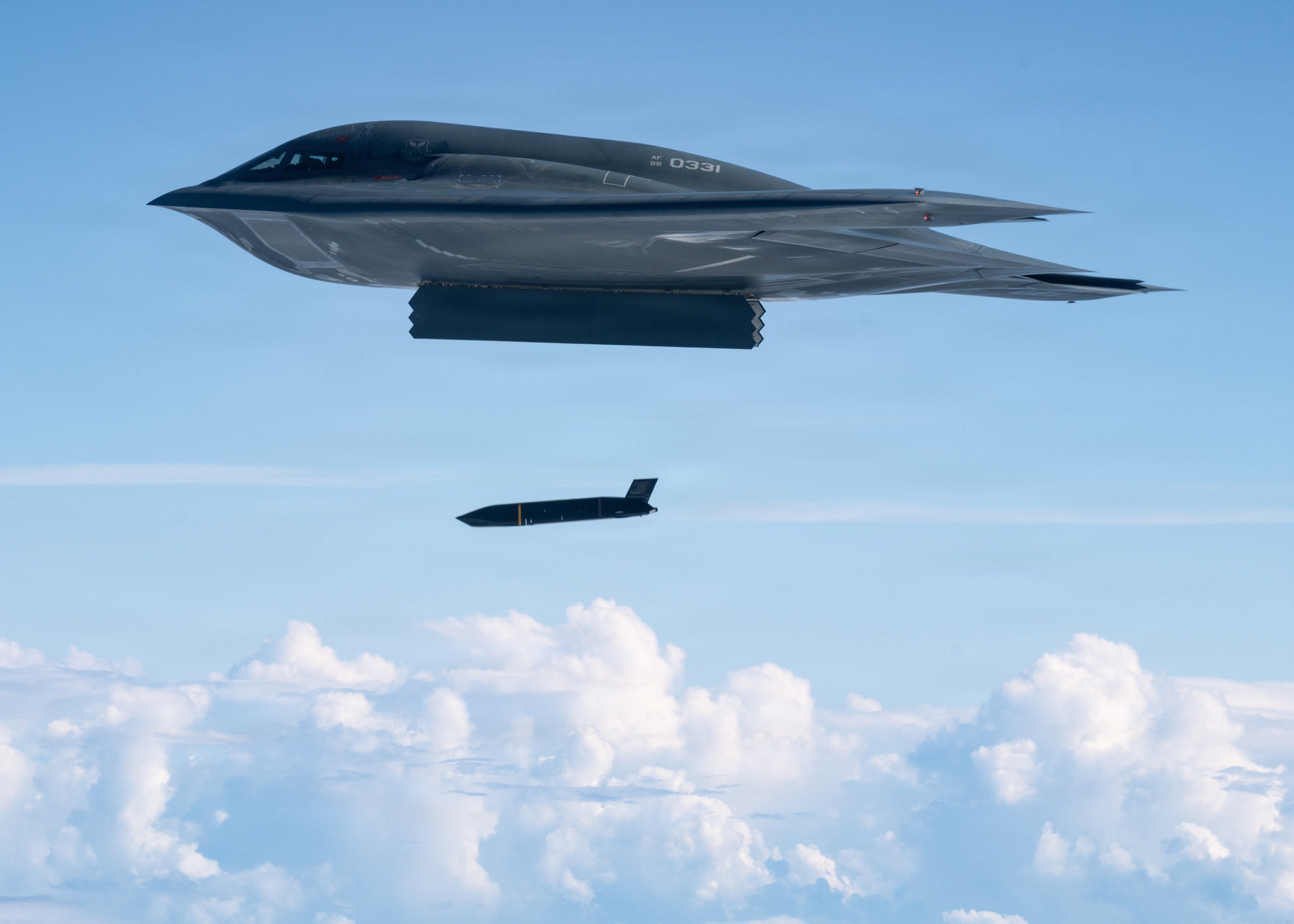 A U.S. Air Force B-2 Spirit Stealth Bomber, assigned to the 509th Bomb Wing, deploys an AGM-158C Long Range Anti-Ship Missile to support a live-fire sinking exercise as part of Valiant Shield 2026 over the Philippine Sea, June 27, 2026. The B-2 flew into the Mariana Island Range Complex to successfully employ the AGM-158C LRASM and demonstrated flexibility across the globe and hold maritime vessels at risk. (U.S. Air Force photo by Tech Sgt. Thomas Barley)