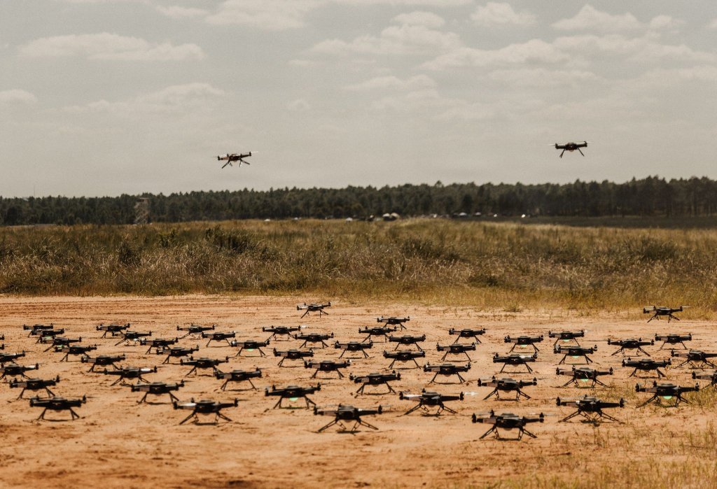 A drone swarm returns from a mission during the XVIII Airborne Corps’ Scarlet Dragon 26-3 at Fort Bragg, N.C., Sept. 15, 2026. Scarlet Dragon used coordinated swarms of up to 100 drones to stress sensor networks, software and air defense crews. Flying realistic aerial threat profiles helped the corps evaluate its ability to detect, track and respond to dense unmanned aircraft system threats. (U.S. Army photo by Pfc. Iliana Lopez)