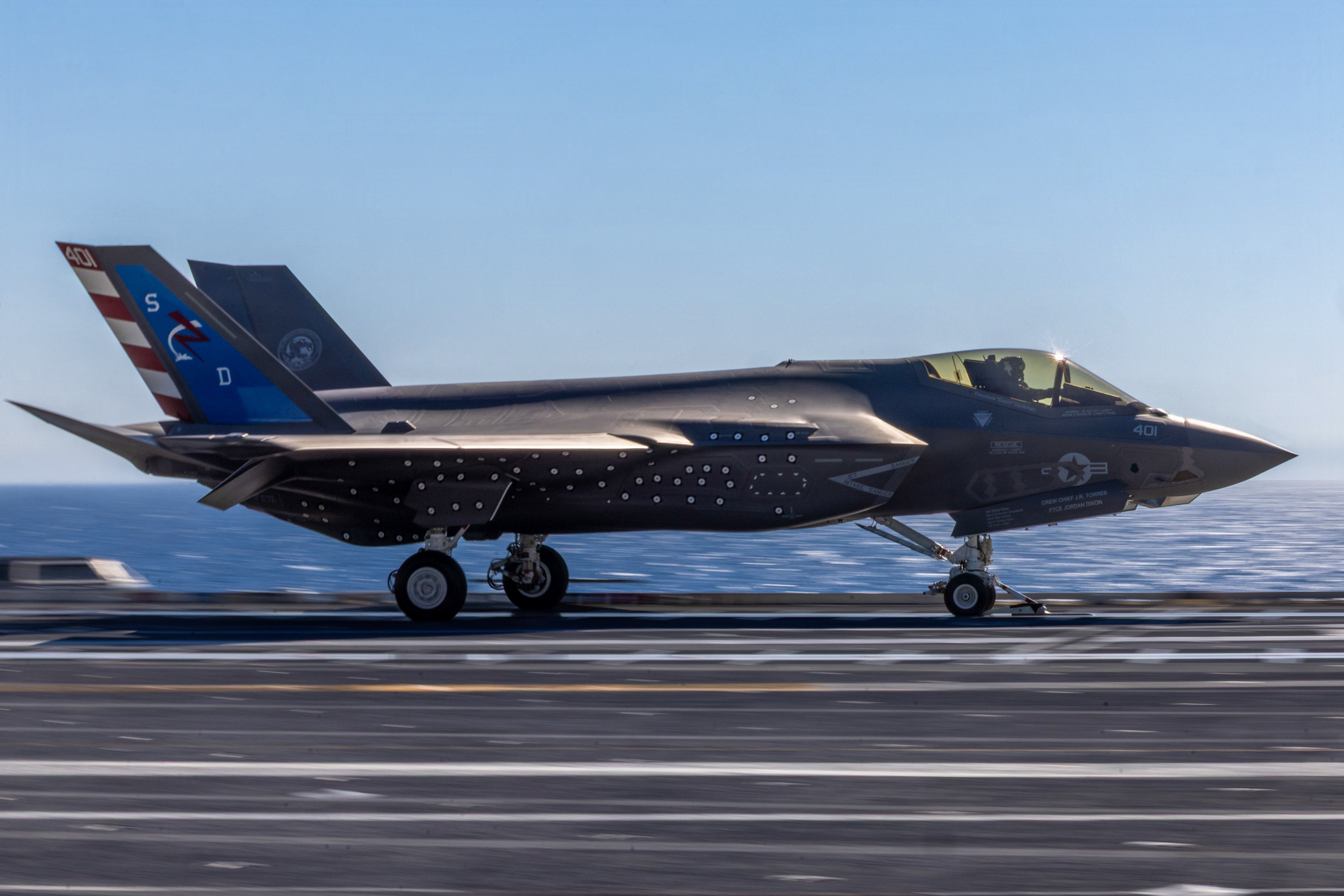 An F-35C Lightning II, attached to the "Salty Dogs" of Air Test and Evaluation Squadron (VX) 23, launches from the flight deck of Pre-Commissioning Unit John F. Kennedy (CVN 79), Oct. 14, 2026, marking the first launch of an F-35C from a Ford-class aircraft carrier. John F. Kennedy is underway conducting Aircraft Compatibility Testing, which assesses the operational capabilities of the ship's aircraft launch and recovery equipment with U.S. Navy aircraft. (U.S. Navy photo by Mass Communication Specialist Seaman Paris McKee)