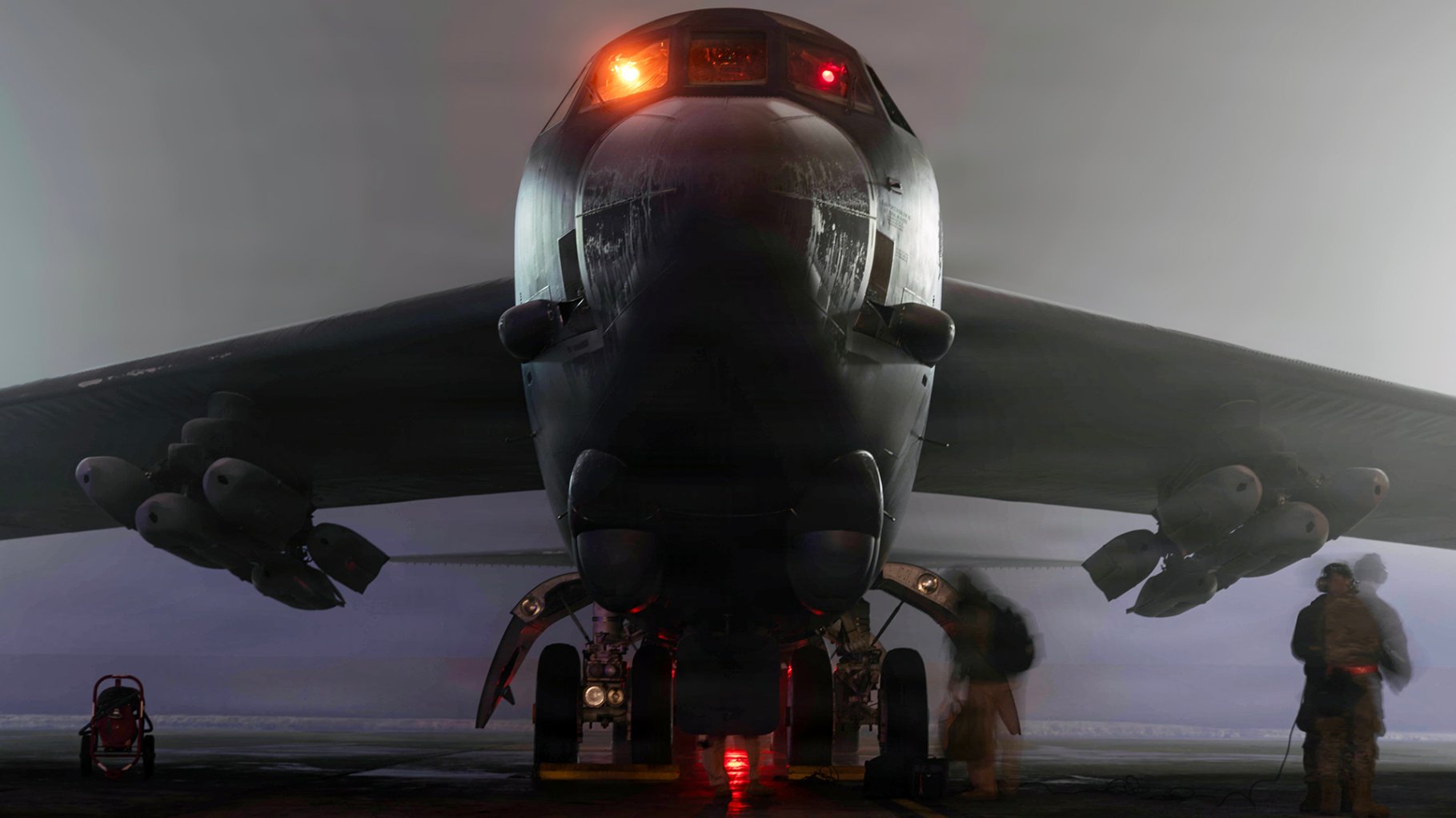 Aircrew members board a B-52H Stratofortress prior to taking off in support of Operation Epic Fury, March 4, 2026.