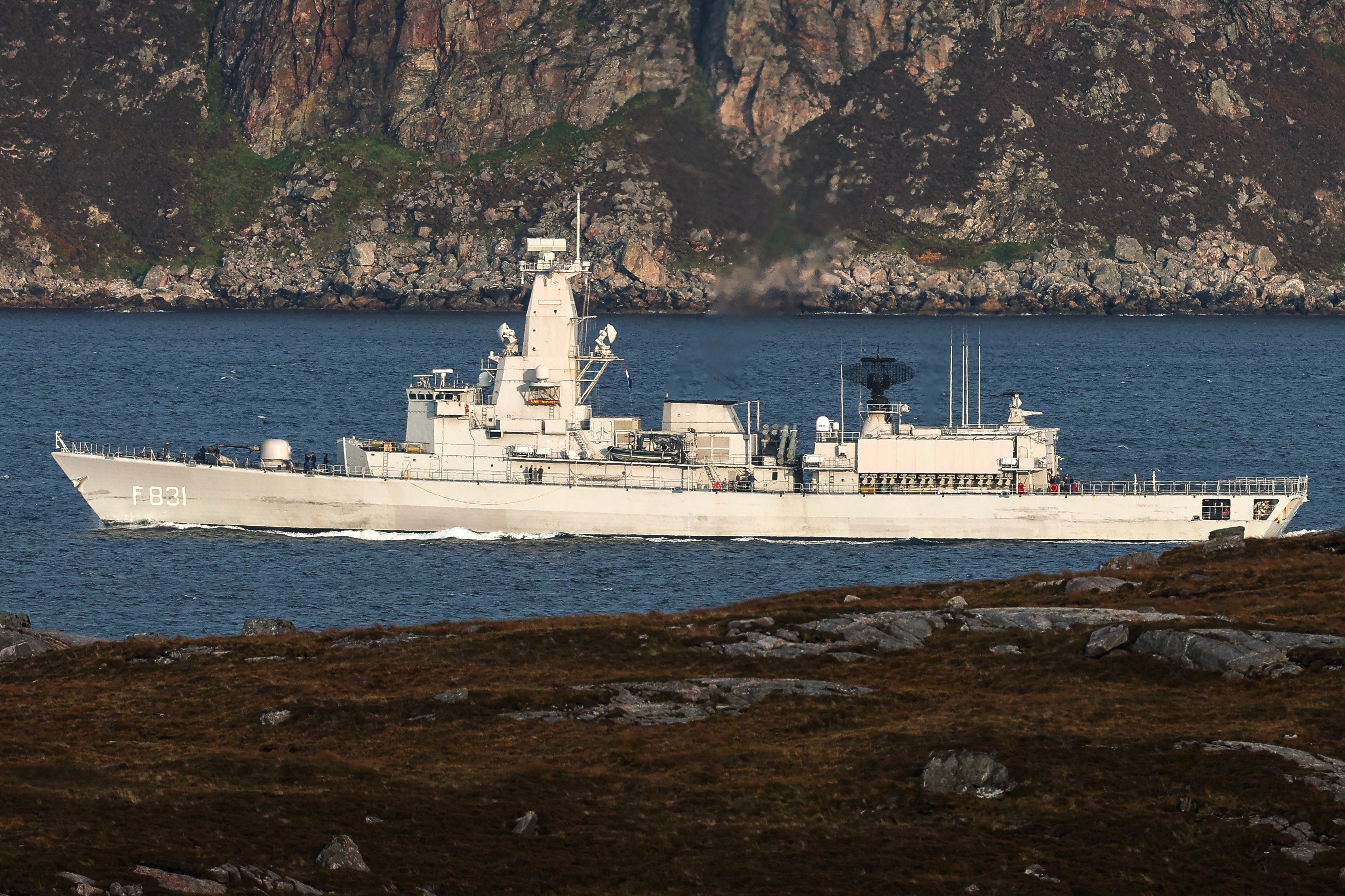 26 Sep 2026 – HNLMS Van Amstel from the Royal Netherlands Navy during Exercise Strike Warrior. Exercise Strike Warrior, 148 (Meiktila) Commando Forward Observation Battery has delivered the Naval Fires Operator Course (NFOC) to its newest observers and personnel from 29 Commando Regiment Royal Artillery. The qualification represents one of the foundational competencies required to operate as part of a Special Observer Team. During the final phase of the course, small teams conducted mission planning before patrolling significant distances to discreetly occupy and sustain themselves within Observation Posts (OPs). Operating in challenging conditions, teams provided persistent surveillance and target acquisition whilst maintaining a low signature throughout the mission. The exercise culminated in the coordination and delivery of Naval Fires from NATO warships from the Netherlands, Portugal and Canada against dynamic targets. Following successful target engagement, teams conducted extraction drills, bringing the scenario to a close. The UK Commando Force are taking part in their largest collective workout in 15 years to demonstrate their ability to safeguard the country – and its allies – against a myriad of threats. Spread across swathes of western Scotland from Cape Wrath to the forests of Galloway and extending into Cumbria, Exercise Strike Warrior runs for four weeks from 21 testing the full panoply of the UK Commando Force’s capabilities. It is the biggest test of almost all elements of the UK Commando Force since it was deployed en masse to Afghanistan on Operation Herrick 15 years ago. Overall, the exercise involves more than 2,000 military personnel from six nations, supported by eight warships and 19 aircraft and helicopters.