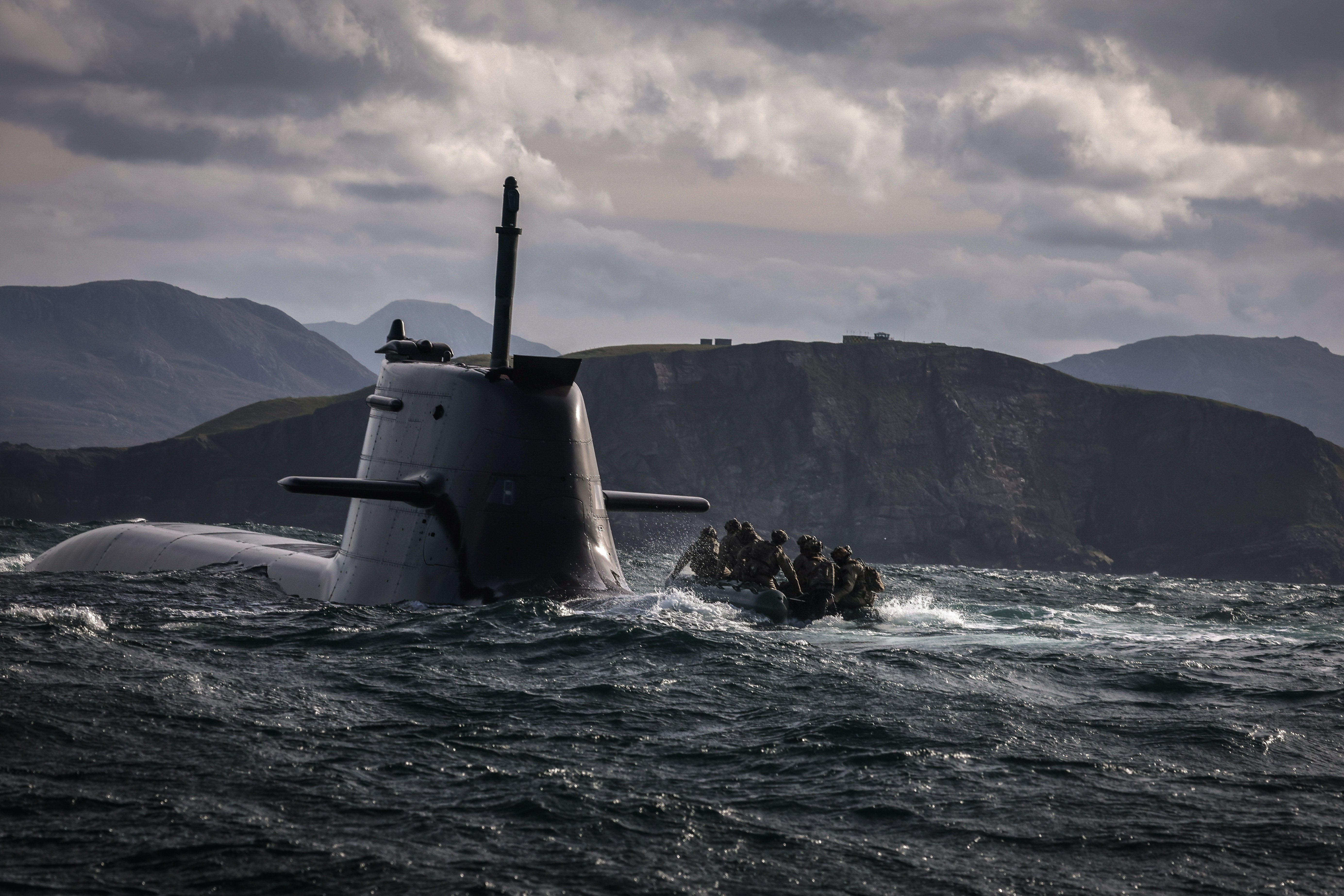 29 Sep 2026 – Meiktila Commandos board German U-Boat off the North coast of Scotland during Strike Warrior 26. 148 (Meiktila) Commando Forward Observation Battery has conducted a Full Mission Profile (FMP), integrating a German Navy submarine and Portuguese warship during Exercise Strike Warrior 26. The serial was designed to rehearse a submarine link-up and develop the Battery’s maritime integration, including float-on/float-off drills with 148’s boats. The force subsequently conducted a submarine infiltration and discreet small-boat insertion towards the target area. The FMP culminated in the establishment of an Observation Post (OP), from which the team coordinated live Naval Surface Fires from the Portuguese warship, resulting in a successful engagement and extraction. The serial demonstrated the capability of NATO partners to integrate specialist assets and coordinate complex activity across the maritime and land domains. The submarine provided Intelligence, Surveillance and Reconnaissance (ISR) support to identify and develop the target, before deploying Special Observation Teams to conduct a tactical beach landing and establish a hasty OP. The Portuguese warship subsequently delivered live Naval Surface Fires against the designated target. “This level of complexity and coordination of live assets has not been achieved by 148 for nearly 30 years. We wanted to demonstrate to our partners across the United Kingdom Commando Force, wider UK Defence and NATO SOF community the type of missions we are prepared to execute against future threats. Warfighting is our focus, and we are prepared to employ specialist assets to deliver Multi-Domain Fires and Targeting.” - Operations Officer, 148 (Meiktila) Commando Forward Observation Battery, Royal Artillery. The UK Commando Force are taking part in their largest collective workout in 15 years to demonstrate their ability to safeguard the country – and its allies – against a myriad of threats.