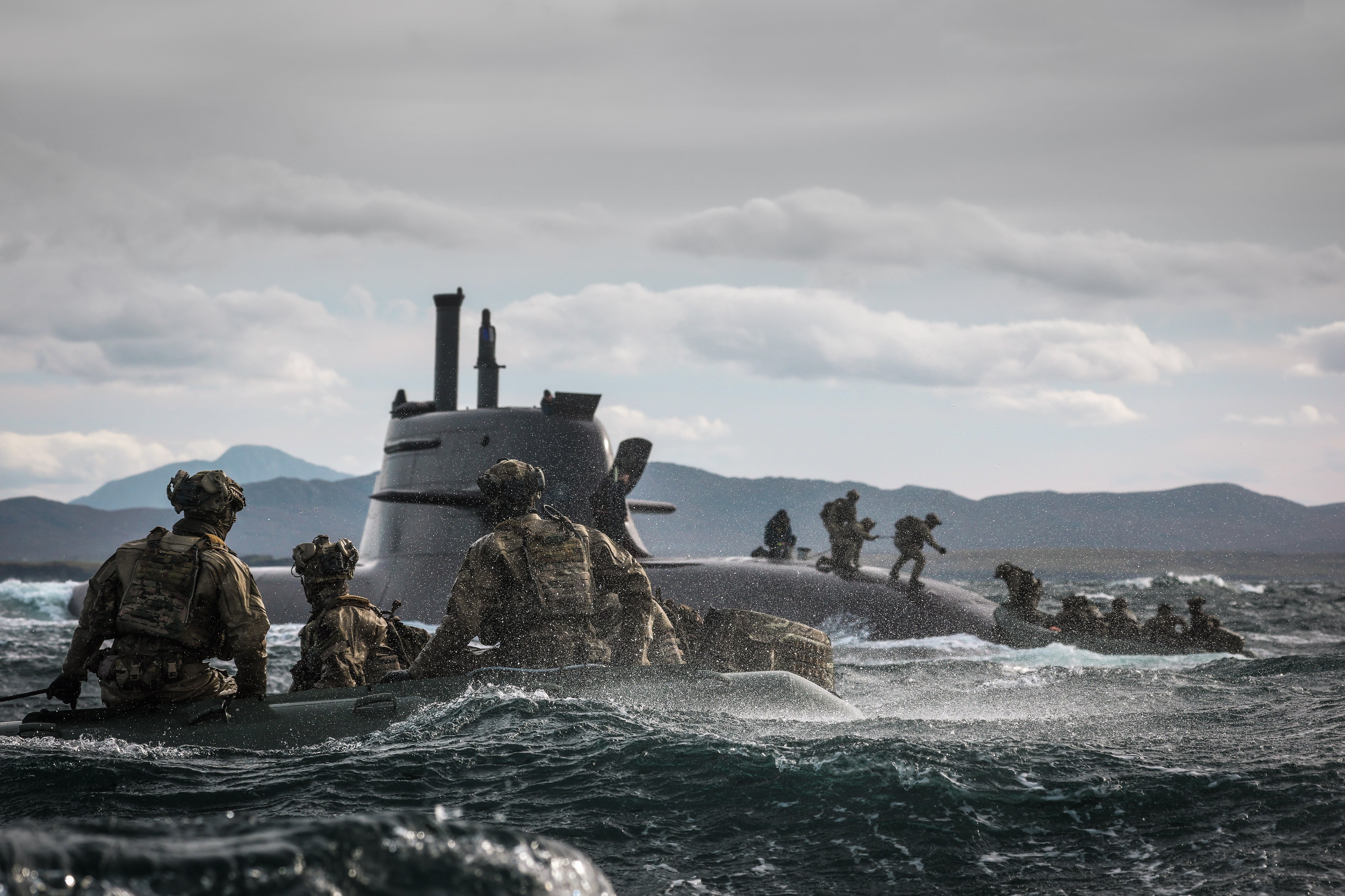 29 Sep 2026 – Meiktila Commandos board German U-Boat off the North coast of Scotland during Strike Warrior 26. 148 (Meiktila) Commando Forward Observation Battery has conducted a Full Mission Profile (FMP), integrating a German Navy submarine and Portuguese warship during Exercise Strike Warrior 26. The serial was designed to rehearse a submarine link-up and develop the Battery’s maritime integration, including float-on/float-off drills with 148’s boats. The force subsequently conducted a submarine infiltration and discreet small-boat insertion towards the target area. The FMP culminated in the establishment of an Observation Post (OP), from which the team coordinated live Naval Surface Fires from the Portuguese warship, resulting in a successful engagement and extraction. The serial demonstrated the capability of NATO partners to integrate specialist assets and coordinate complex activity across the maritime and land domains. The submarine provided Intelligence, Surveillance and Reconnaissance (ISR) support to identify and develop the target, before deploying Special Observation Teams to conduct a tactical beach landing and establish a hasty OP. The Portuguese warship subsequently delivered live Naval Surface Fires against the designated target. “This level of complexity and coordination of live assets has not been achieved by 148 for nearly 30 years. We wanted to demonstrate to our partners across the United Kingdom Commando Force, wider UK Defence and NATO SOF community the type of missions we are prepared to execute against future threats. Warfighting is our focus, and we are prepared to employ specialist assets to deliver Multi-Domain Fires and Targeting.” - Operations Officer, 148 (Meiktila) Commando Forward Observation Battery, Royal Artillery. The UK Commando Force are taking part in their largest collective workout in 15 years to demonstrate their ability to safeguard the country – and its allies – against a myriad of threats.