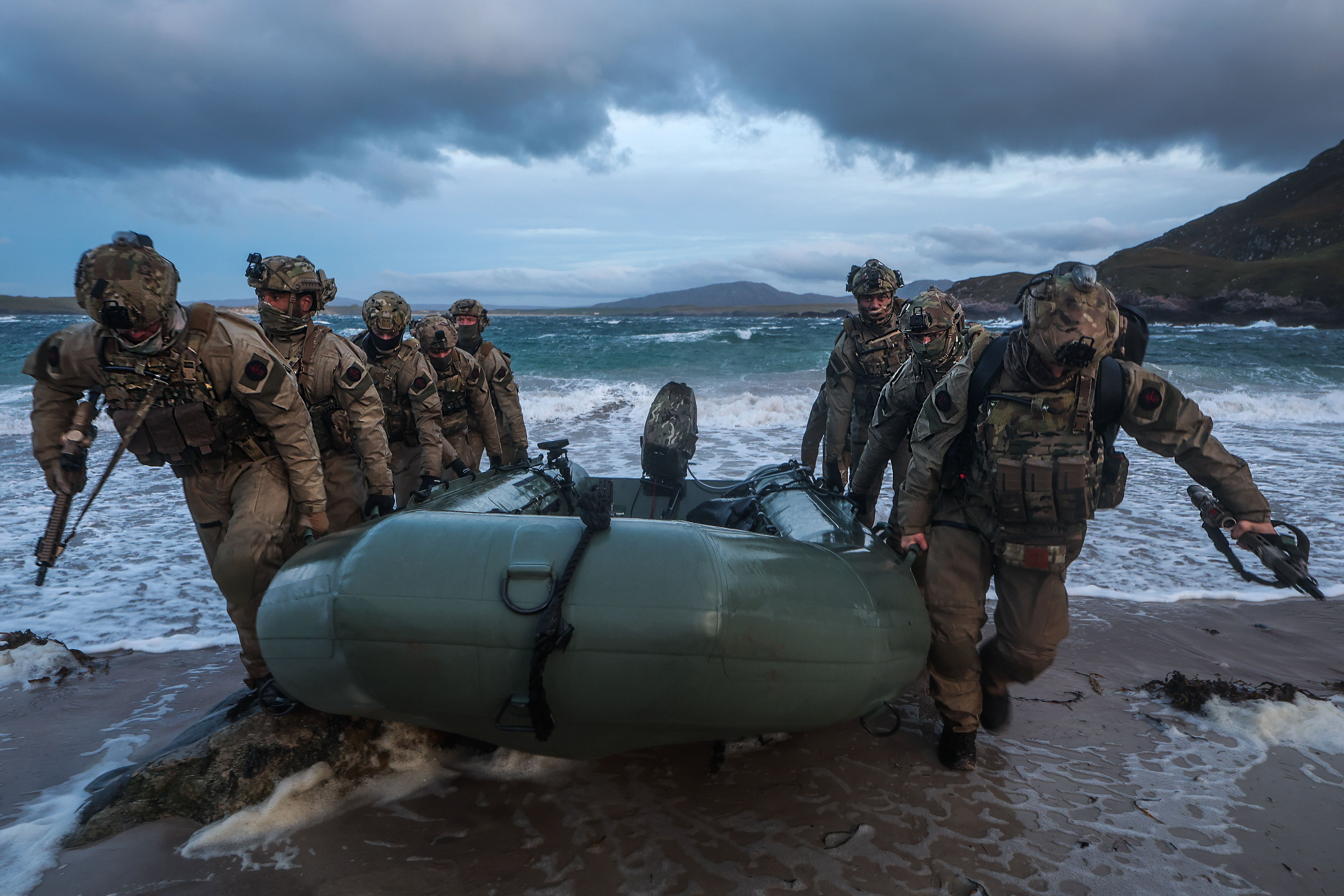 29 Sep 2026 – 148 Battery secure a remote beach in Cape Wrath. 148 (Meiktila) Commando Forward Observation Battery has conducted a Full Mission Profile (FMP), integrating a German Navy submarine and Portuguese warship during Exercise Strike Warrior 26. The serial was designed to rehearse a submarine link-up and develop the Battery’s maritime integration, including float-on/float-off drills with 148’s boats. The force subsequently conducted a submarine infiltration and discreet small-boat insertion towards the target area. The FMP culminated in the establishment of an Observation Post (OP), from which the team coordinated live Naval Surface Fires from the Portuguese warship, resulting in a successful engagement and extraction. The serial demonstrated the capability of NATO partners to integrate specialist assets and coordinate complex activity across the maritime and land domains. The submarine provided Intelligence, Surveillance and Reconnaissance (ISR) support to identify and develop the target, before deploying Special Observation Teams to conduct a tactical beach landing and establish a hasty OP. The Portuguese warship subsequently delivered live Naval Surface Fires against the designated target. “This level of complexity and coordination of live assets has not been achieved by 148 for nearly 30 years. We wanted to demonstrate to our partners across the United Kingdom Commando Force, wider UK Defence and NATO SOF community the type of missions we are prepared to execute against future threats. Warfighting is our focus, and we are prepared to employ specialist assets to deliver Multi-Domain Fires and Targeting.” - Operations Officer, 148 (Meiktila) Commando Forward Observation Battery, Royal Artillery. The UK Commando Force are taking part in their largest collective workout in 15 years to demonstrate their ability to safeguard the country – and its allies – against a myriad of threats.