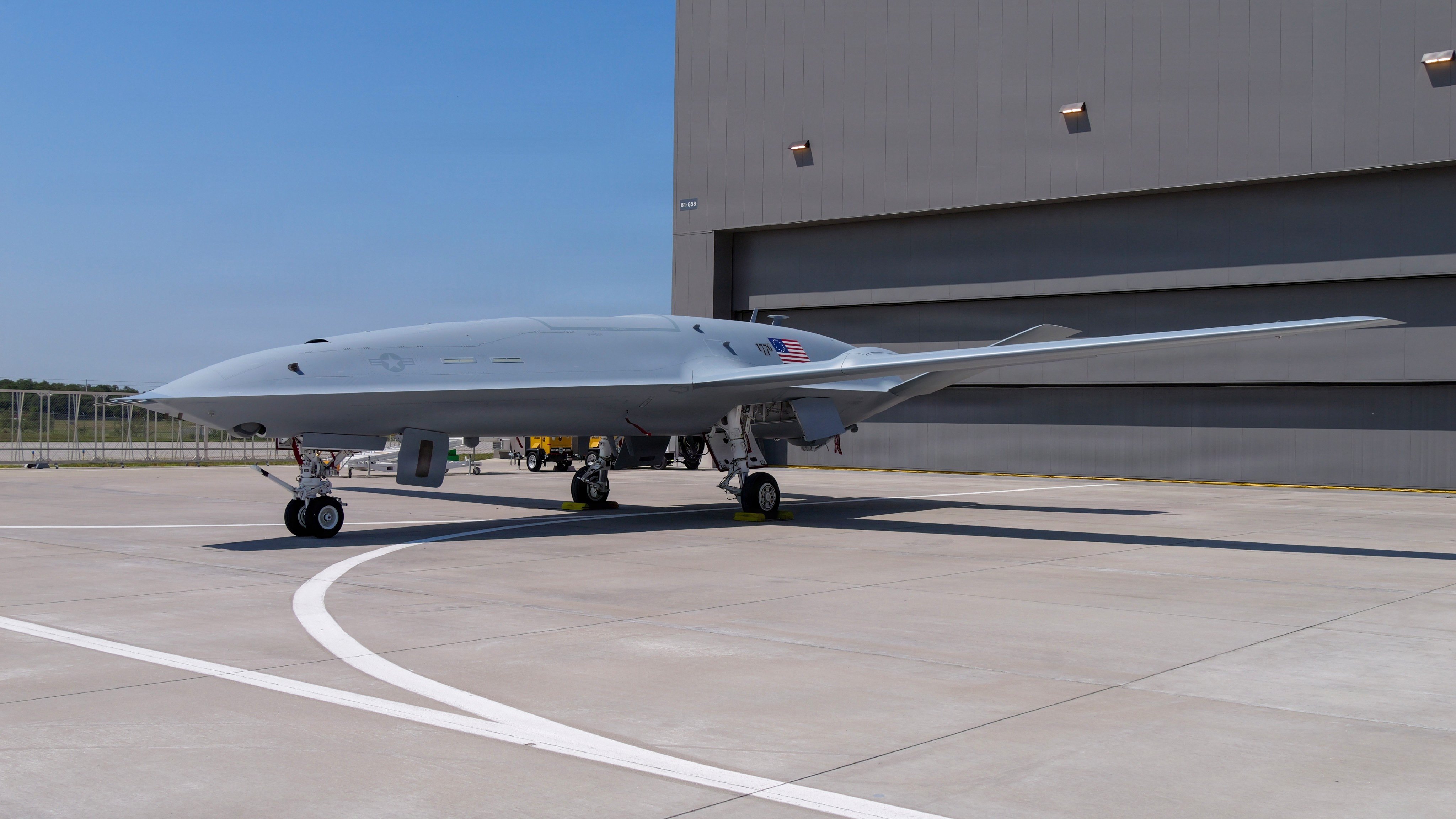 The first painted MQ‑25A Stingray sits on the ramp outside Boeing’s dedicated MQ‑25 production facility in Mascoutah, Illinois. The aircraft was recently painted ahead of continued developmental testing.
