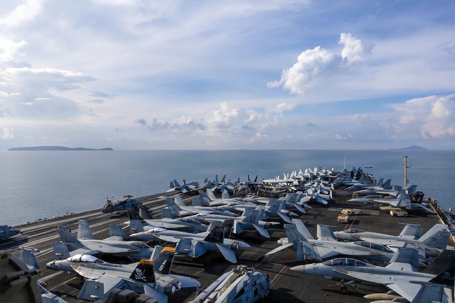 Nimitz-class aircraft carrier George H.W. Bush (CVN 77) departs Phuket, Thailand, Oct. 9, 2026. George H.W. Bush is conducting routine operations in the U.S. 7th Fleet area of operations. U.S. 7th Fleet, the Navy’s largest forward-deployed numbered fleet, routinely interacts and operates with allies and partners in preserving a free and open Indo-Pacific. (U.S. Navy photo)