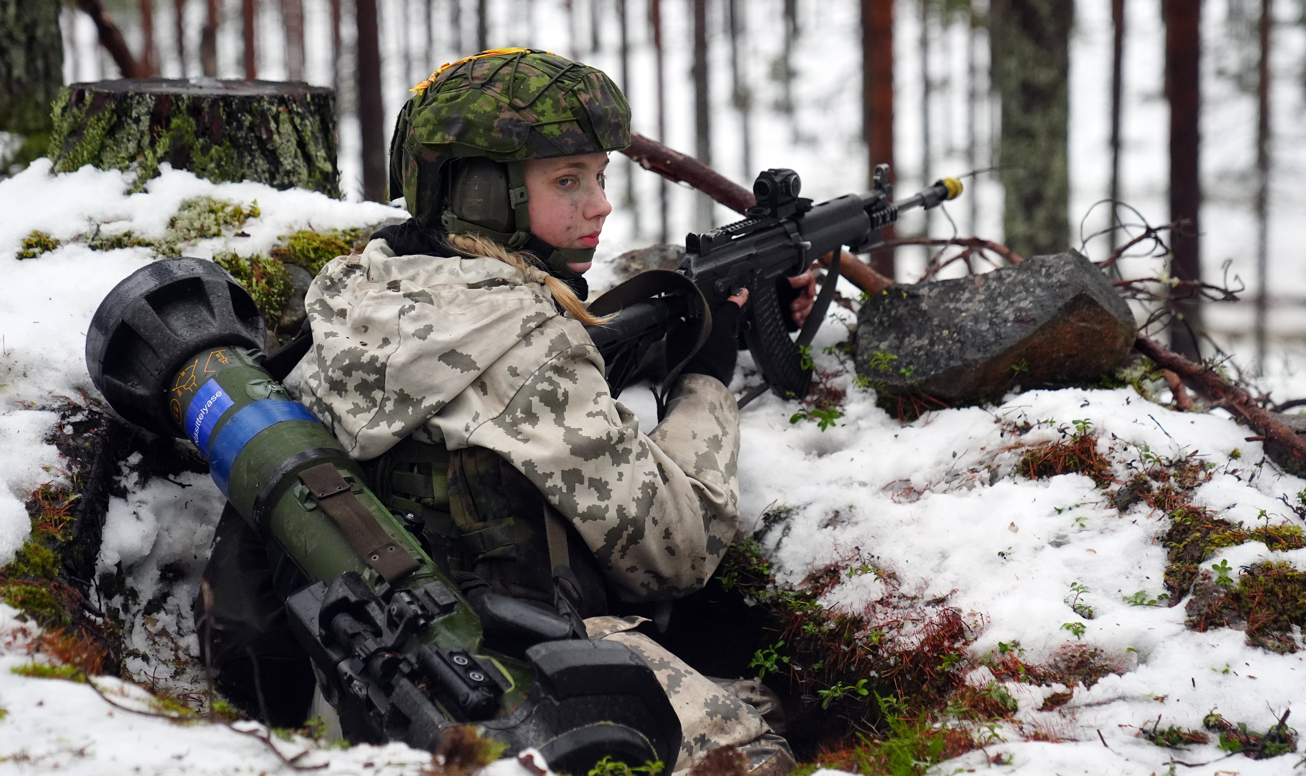 Finnish soldiers at Vuosanka near Kajaani as British soldiers train during a major exercise on NATO's border with Russia. A company of 3 Rifles, based in Edinburgh, has spent six weeks training in the north of Finland, during where they honed their survival skills in temperatures as low as minus 28C. Picture date: Wednesday December 3, 2025. (Photo by Owen Humphreys/PA Images via Getty Images)