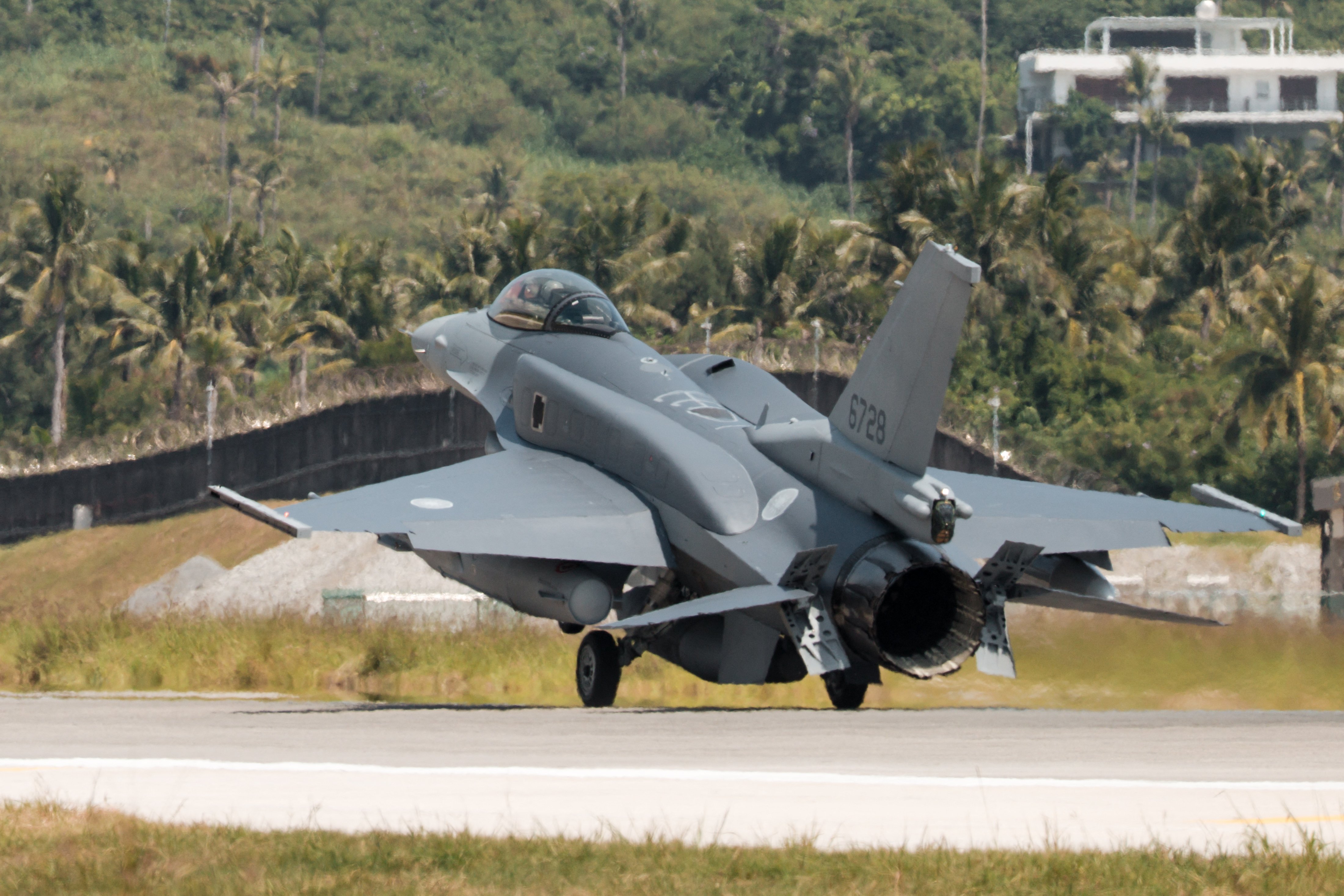 A newly purchased F-16V Block 70 fighter jet lands at Chihhang Air Base in Taitung on October 2, 2026. Taiwan received its first two US-made F-16V fighter jets, as the island democracy upgrades its military capabilities to deter a potential Chinese attack. The warplanes are part of an $8 billion deal for 66 F-16Vs approved during US President Donald Trump's first term and scheduled for delivery this year. (Photo by CHENG Yu-chen / AFP via Getty Images)