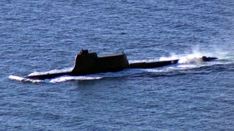 North Korea says it has test-fired two types of submarine-launched strategic cruise missiles off its east coast, in what could be a significant step toward bringing a larger submarine into service. If the launch platform was the Hero Kim Kun Ok, as imagery assessments cited by outside analysts suggest, the tests would mark the first publicly reported weapons trials from a vessel Pyongyang has portrayed as central to its future nuclear-armed navy.