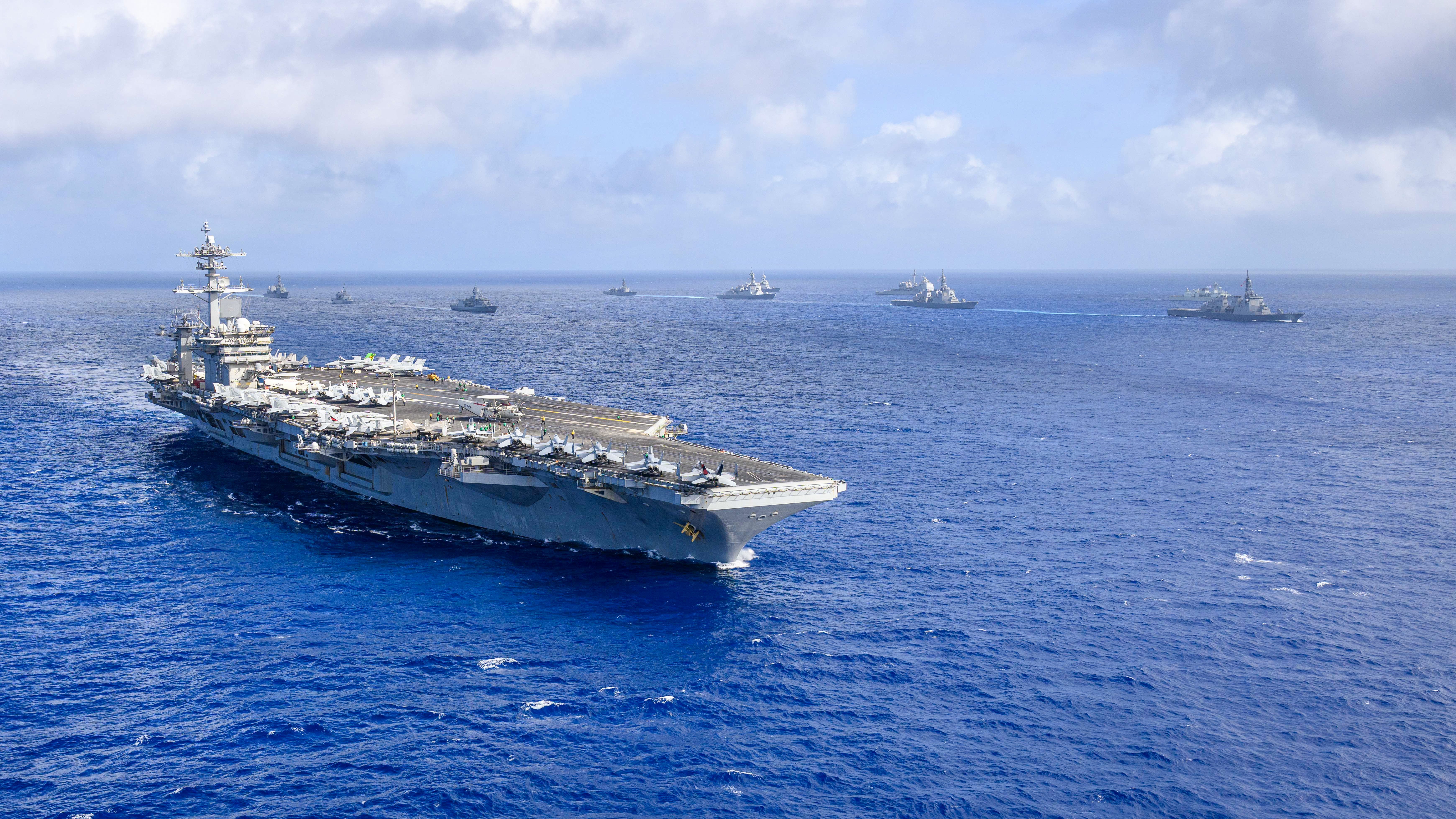 U.S. Navy, Japan Maritime Self-Defense Force, Royal Australian Navy, Royal Canadian Navy, and French Navy ships steam together during Exercise Keen Sword 27 (KS27), Oct. 21, 2026 in the Philippine Sea. Keen Sword is a routine, biennial bilateral field training exercise with multinational participation, designed to increase readiness and interoperability between the U.S. military and Japan Self-Defense Forces while strengthening the ironclad U.S.-Japan Alliance.