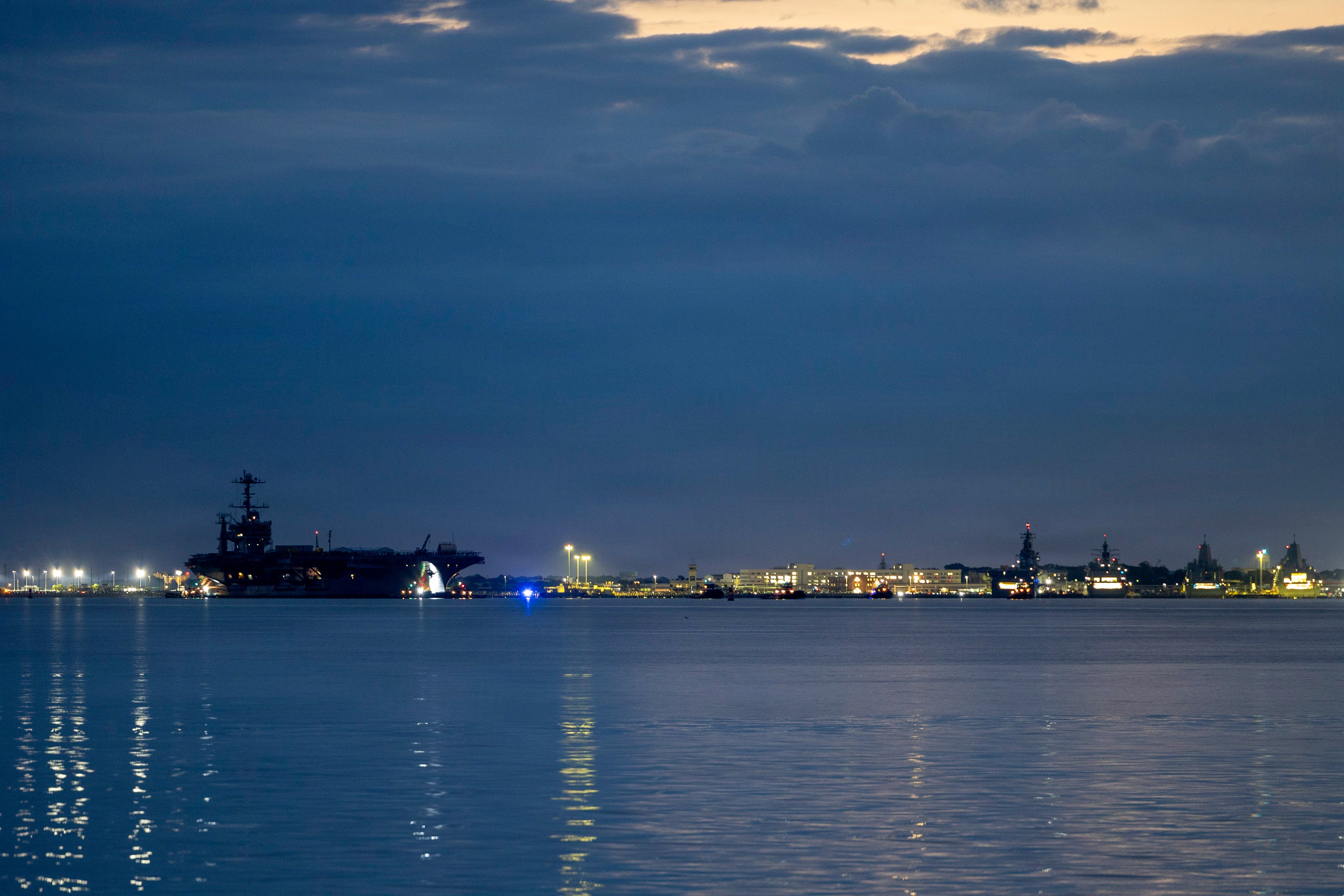 The Nimitz-class aircraft carrier USS Harry S. Truman (CVN 75) transits the Elizabeth River while departing Naval Station Norfolk for Newport News Shipbuilding to begin the shipyard phase of its Refueling and Complex Overhaul (RCOH), Sept. 30, 2026. The overhaul will include extensive maintenance and modernization before Truman returns to the fleet for the second half of its planned service life. (U.S. Navy photo by Mass Communication Specialist Seaman Apprentice Stryker Cole)
