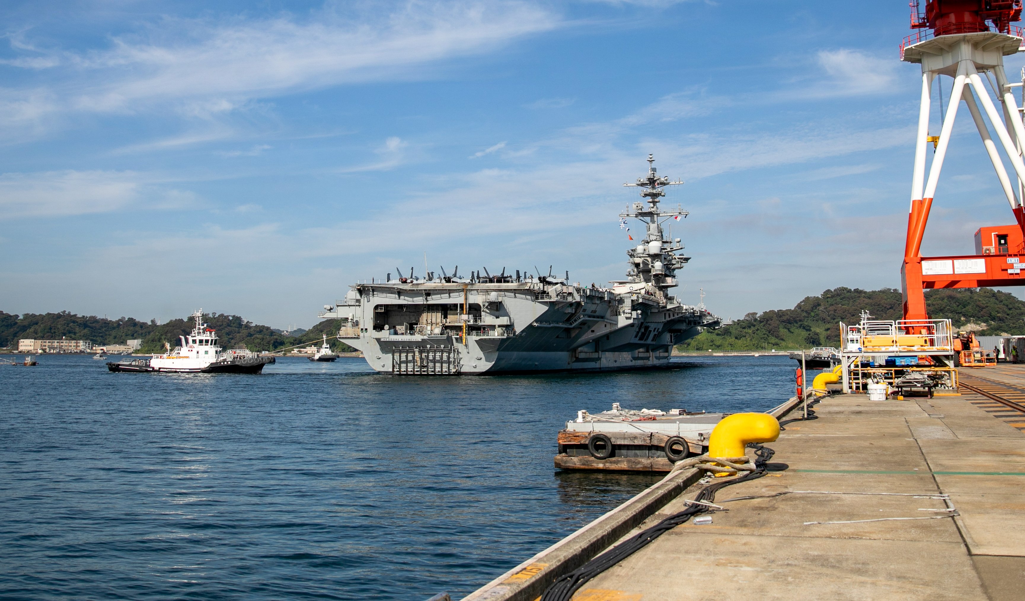 Nimitz-class aircraft carrier USS Theodore Roosevelt (CVN 71), flagship of Carrier Strike Group (CSG) 9, and Ticonderoga-class guided-missile cruiser USS Chosin (CG 65) arrived at Commander, Fleet Activities Yokosuka, Oct. 16, 2026, ahead of exercise Keen Sword. (U.S. Navy photo by Mass Communication Specialist 1st Class Hannah Fry)