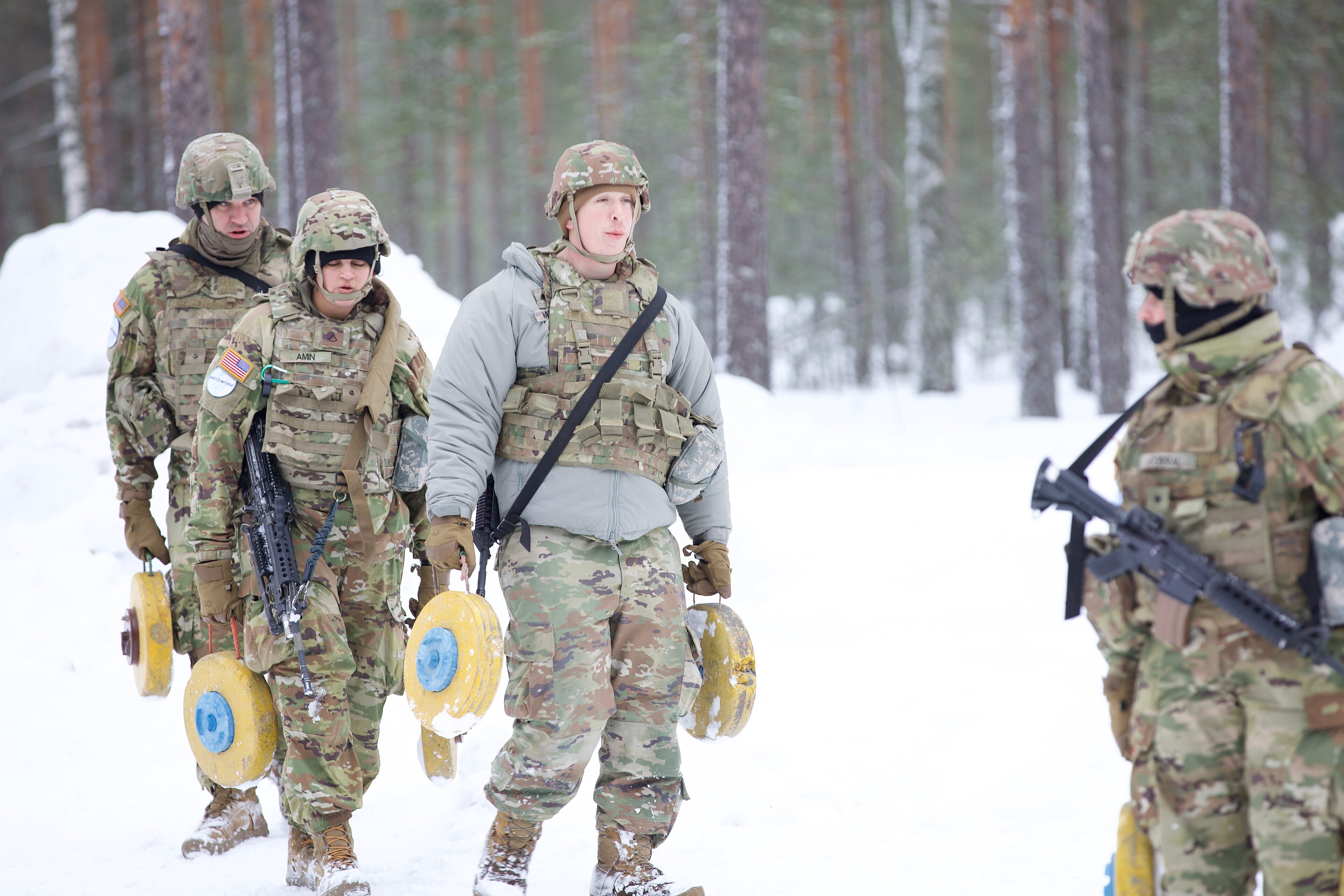 Virginia Army National Guard Soldiers assigned to the West Point-based 237th Engineer Company, 276th Engineer Battalion, 329th Regional Support Group train on multiple techniques for both the hasty and deliberate emplacement of anti-tank mines with trainers from the Finnish Army’s Karelia Brigade during Exercise Arctic Forge 25, Feb. 22, 2025, near Kouvola, Finland. Arctic Forge 25 is a U.S. Army multilateral exercise in Finland and Norway, focused on enhancing arctic military capabilities and cooperation with a focus on honing U.S. troops skills to survive, fight, and win in the Arctic’s austere conditions. The Virginia National Guard’s participation strengthens its partnership with the Finnish Defense Force, formalized in May 2024 through the Department of Defense’s State Partnership Program. (U.S. Army National Guard photos by Staff Sgt. Marc Heaton)
