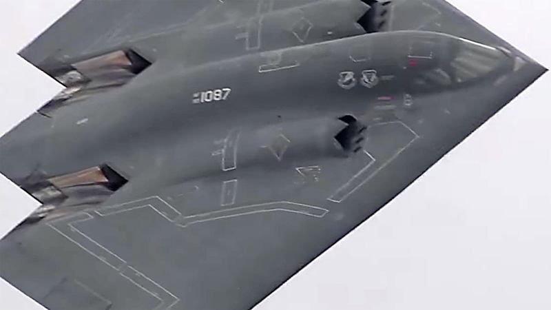 B-2 Stealth Bomber Flanked By F-15s Stuns At The Royal International Air Tattoo