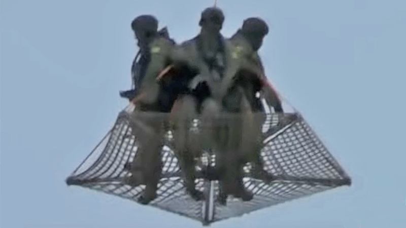 Special Operators Fly Across Moscow Skyline On Tactical Platform Slung Below Mi-8 Helo