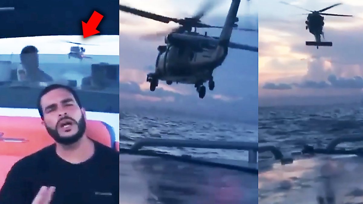观看这架UH-60黑鹰直升机如何扑向毫无防备的快艇,然后垂直俯冲
