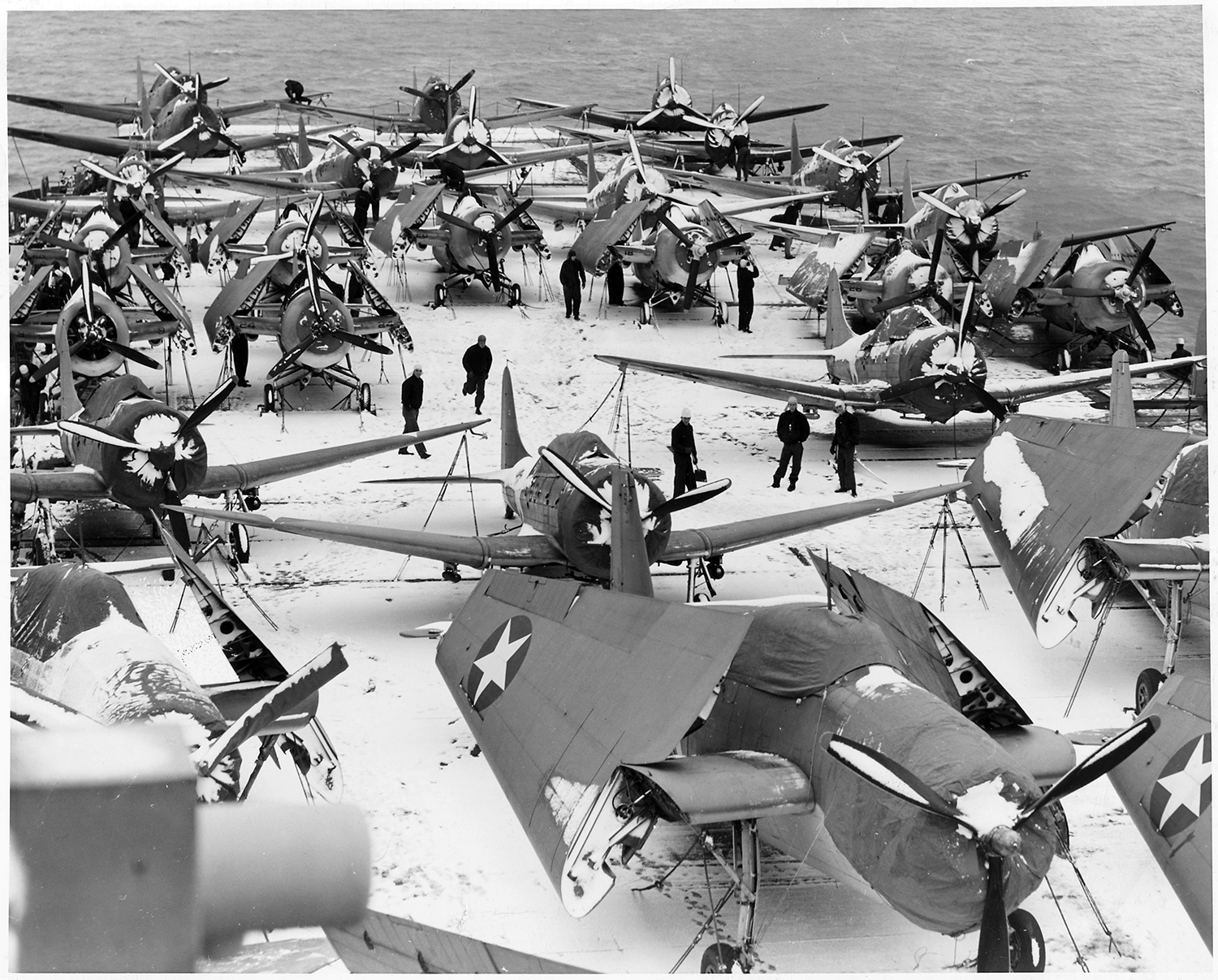 message-editor%2F1483955901988-u.s._navy_aircraft_carrier_at_a_north_atalantic_port._spotted_on_the_snow-covered_flight_deck_are_douglas_dauntless..._-_nara_-_196197.tif.jpg
